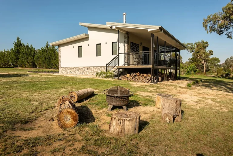 Bella Vista Stanthorpe holiday cottage exterior with fire pit and parkland views